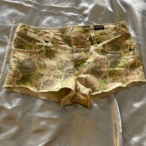Volvos floral print cut off jean shorts
